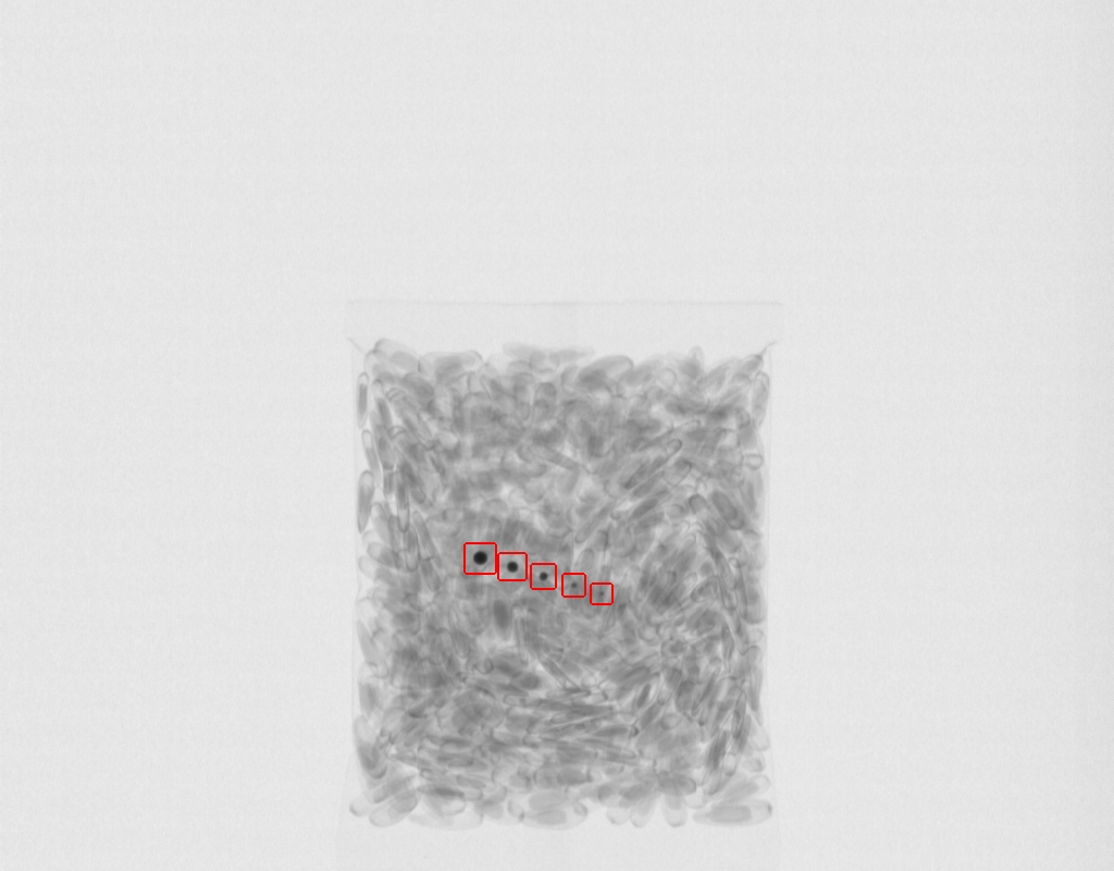 Foreign body inside a bagged product — X-ray inspection image
