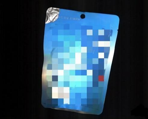 Surface damage on a bagged product — vision inspection image